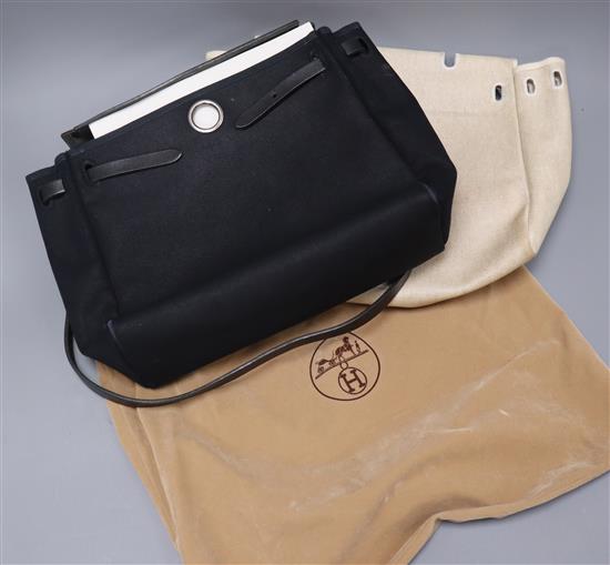 A Hermes white and black Herbag with dust bag (circa 2000, purchased in London)